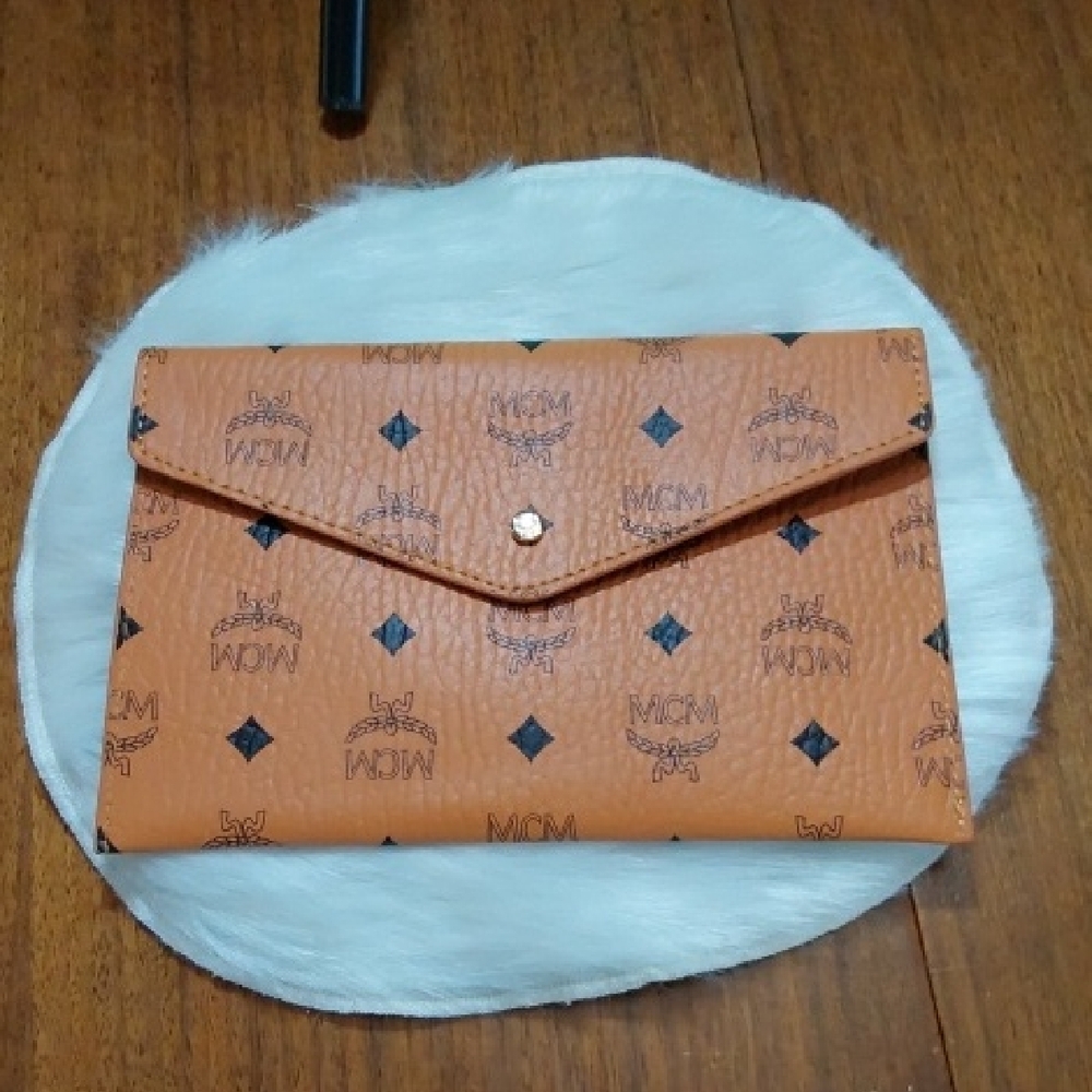 MCM Cognac Monogram Clutch